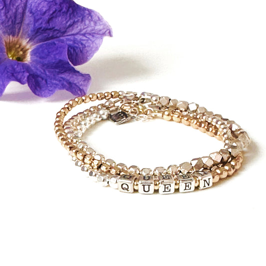 Queen Mixed Metals stacking Bracelet shown with sterling silver and 14k gold beaded stacking bracelets