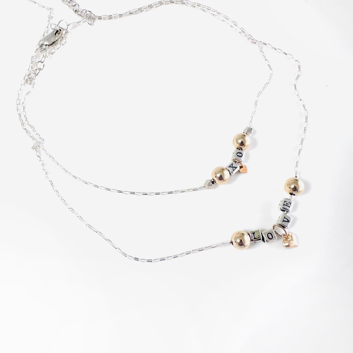 Delicate Valentine necklaces with sterling silver and 14k gold beads and hearts,