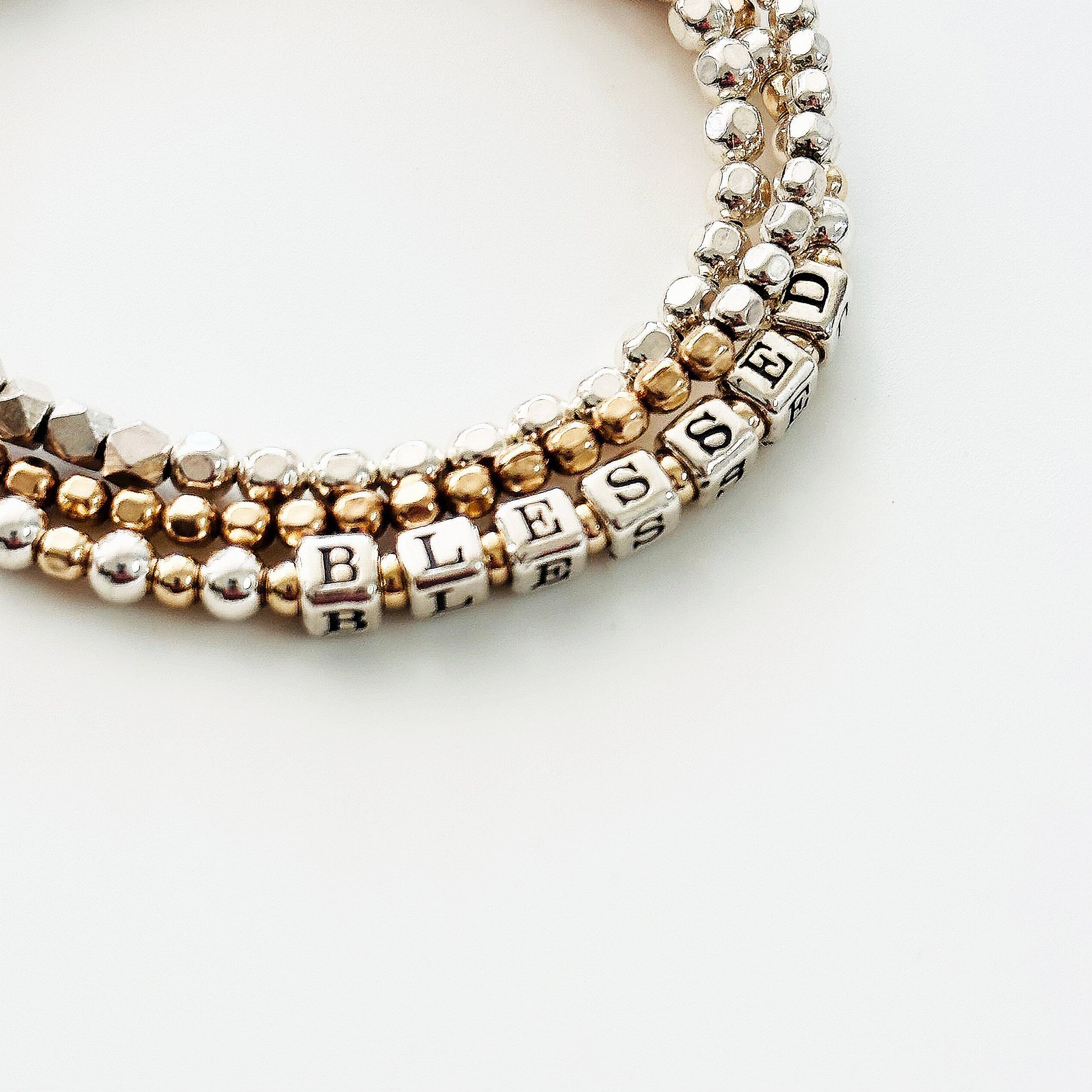 Sterling Silver and 14k Gold  beaded gift bracelet spells out the affirmation BLESSED