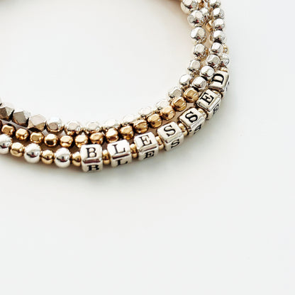 Sterling Silver and 14k Gold  beaded gift bracelet spells out the affirmation BLESSED