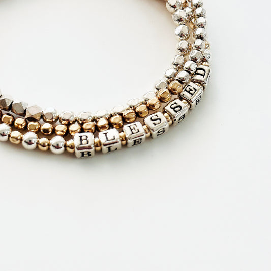 Sterling Silver and 14k Gold  beaded gift bracelet spells out the affirmation BLESSED