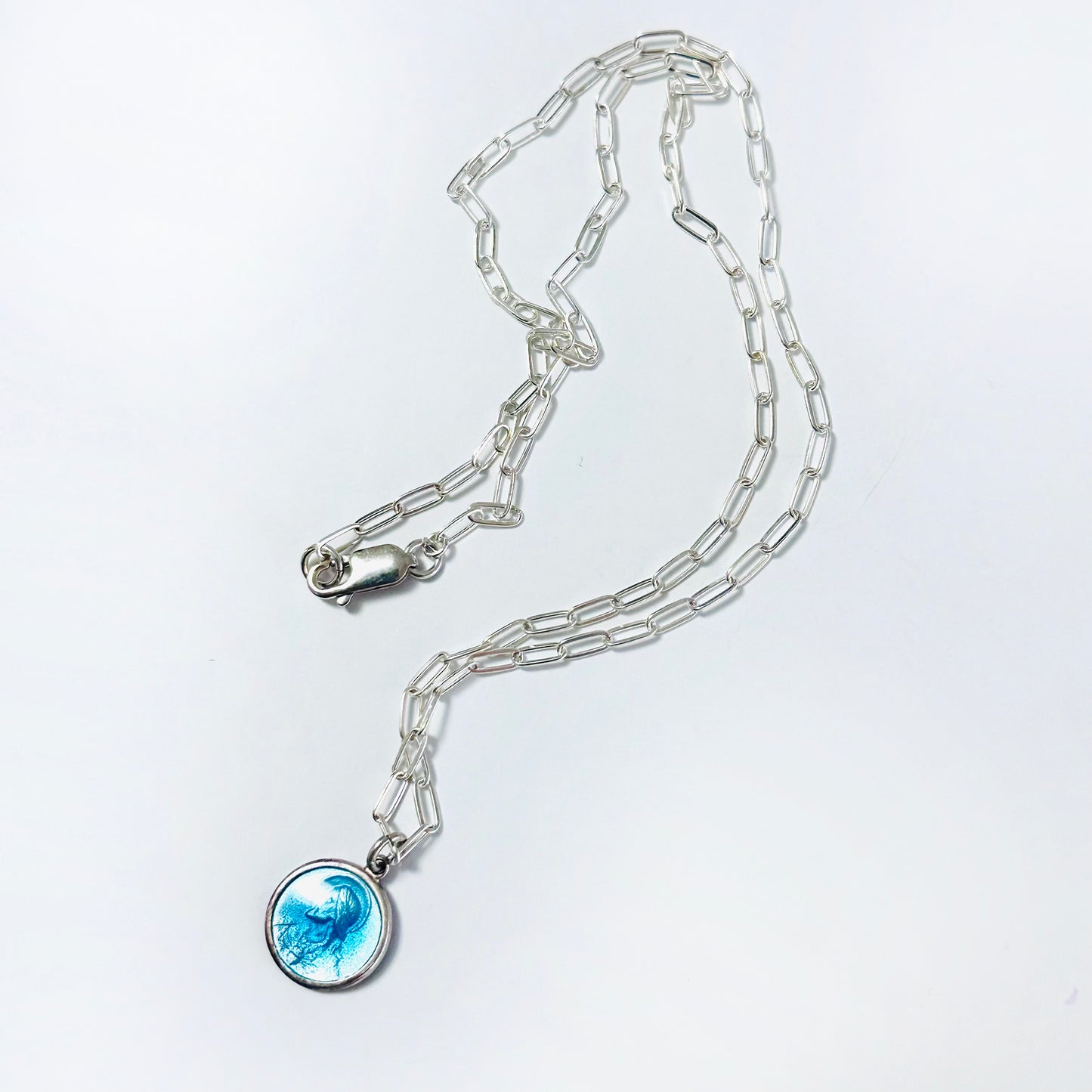 Catholic or Christian sterling silver necklace with vintage medal of Jesus in blue enamel