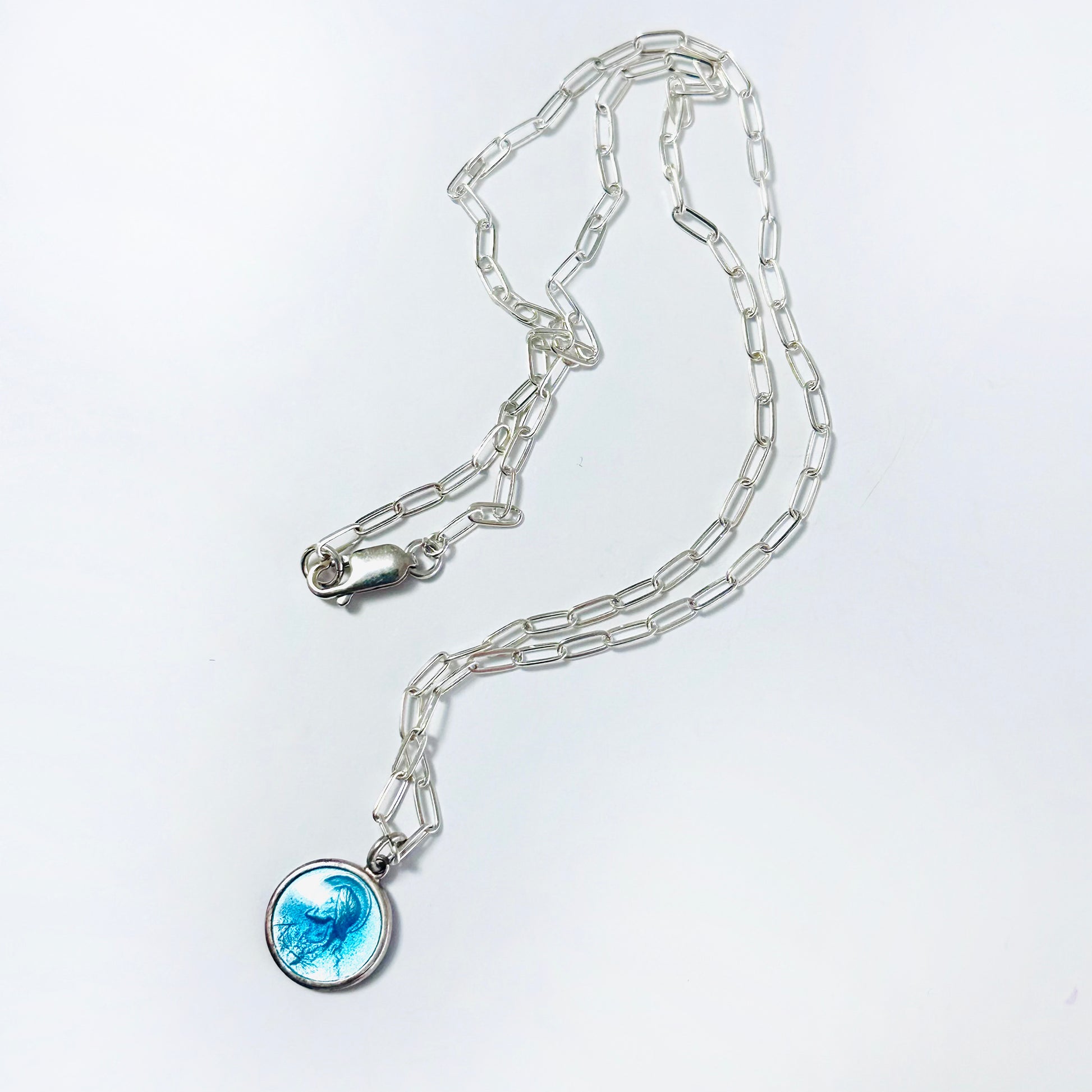 Catholic or Christian sterling silver necklace with vintage medal of Jesus in blue enamel