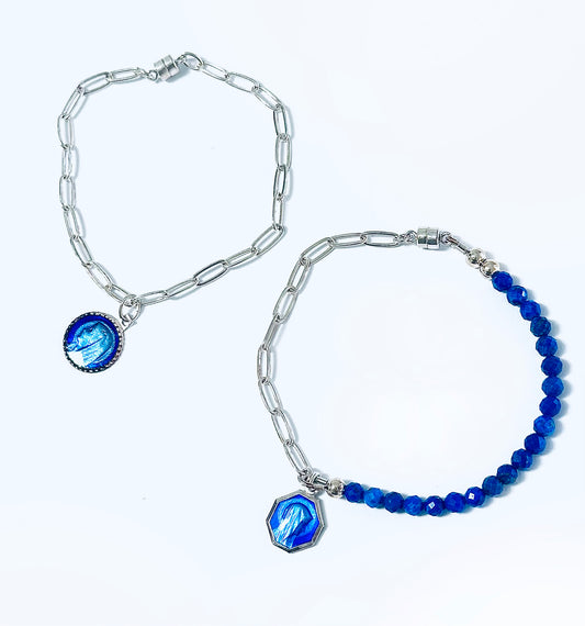 Two modern Catholic jewelry bracelets, with sterling silver and blue medals of Lourdes Mother Mary