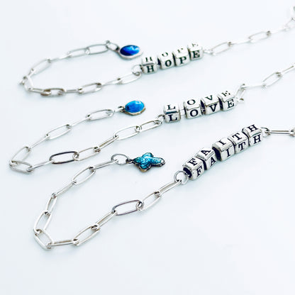 Delicate sterling silver Faith Hope Love  Christina  bracelets with vintage blue charms