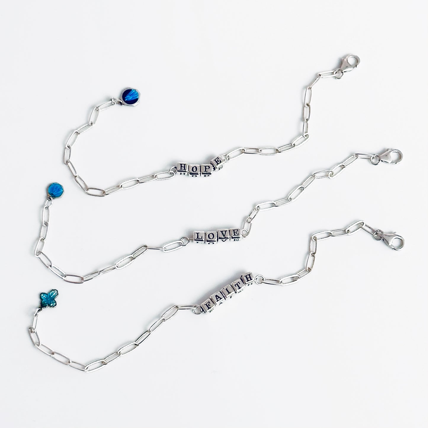 Delicate sterling silver Faith Hope Love Christian gift bracelets with vintage blue medal charms 