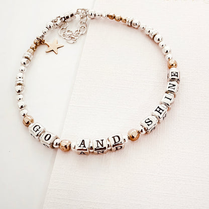 sterling silver and 14k gold Bracelet with letter beads spelling 'GOLD AND SUNSHINE' for College Graduation gift