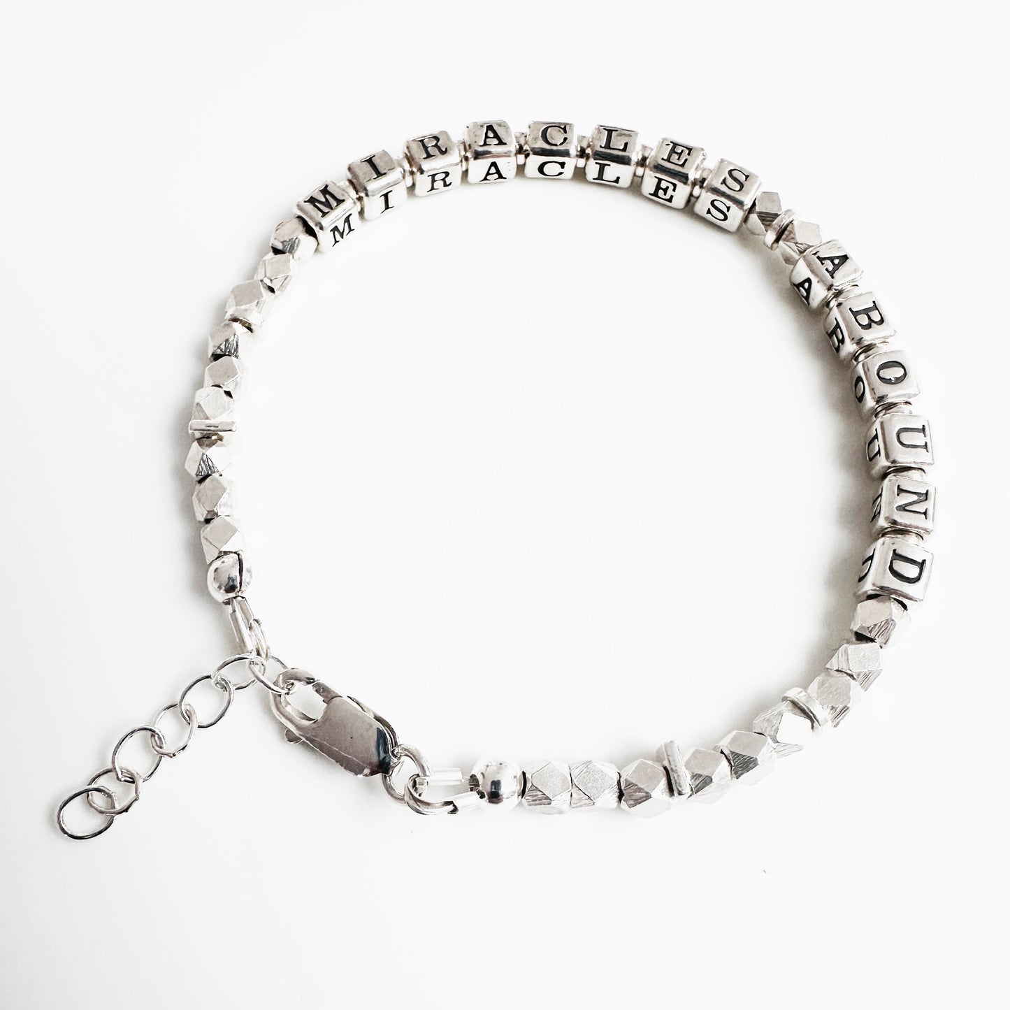 Sterling Silver Gift Bracelet for hope and gratitude spells out MIRACLES ABOUND