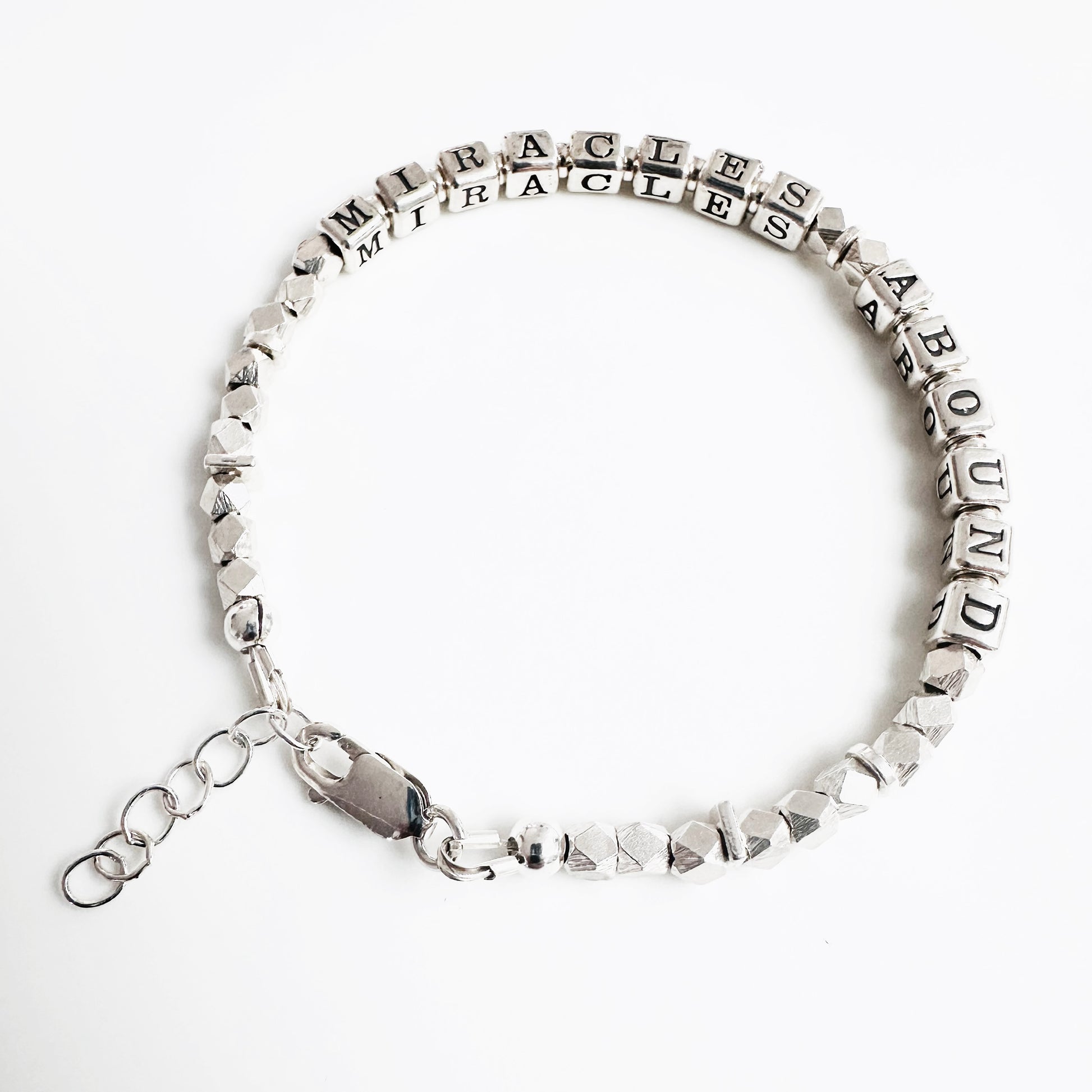 Sterling Silver Gift Bracelet for hope and gratitude spells out MIRACLES ABOUND