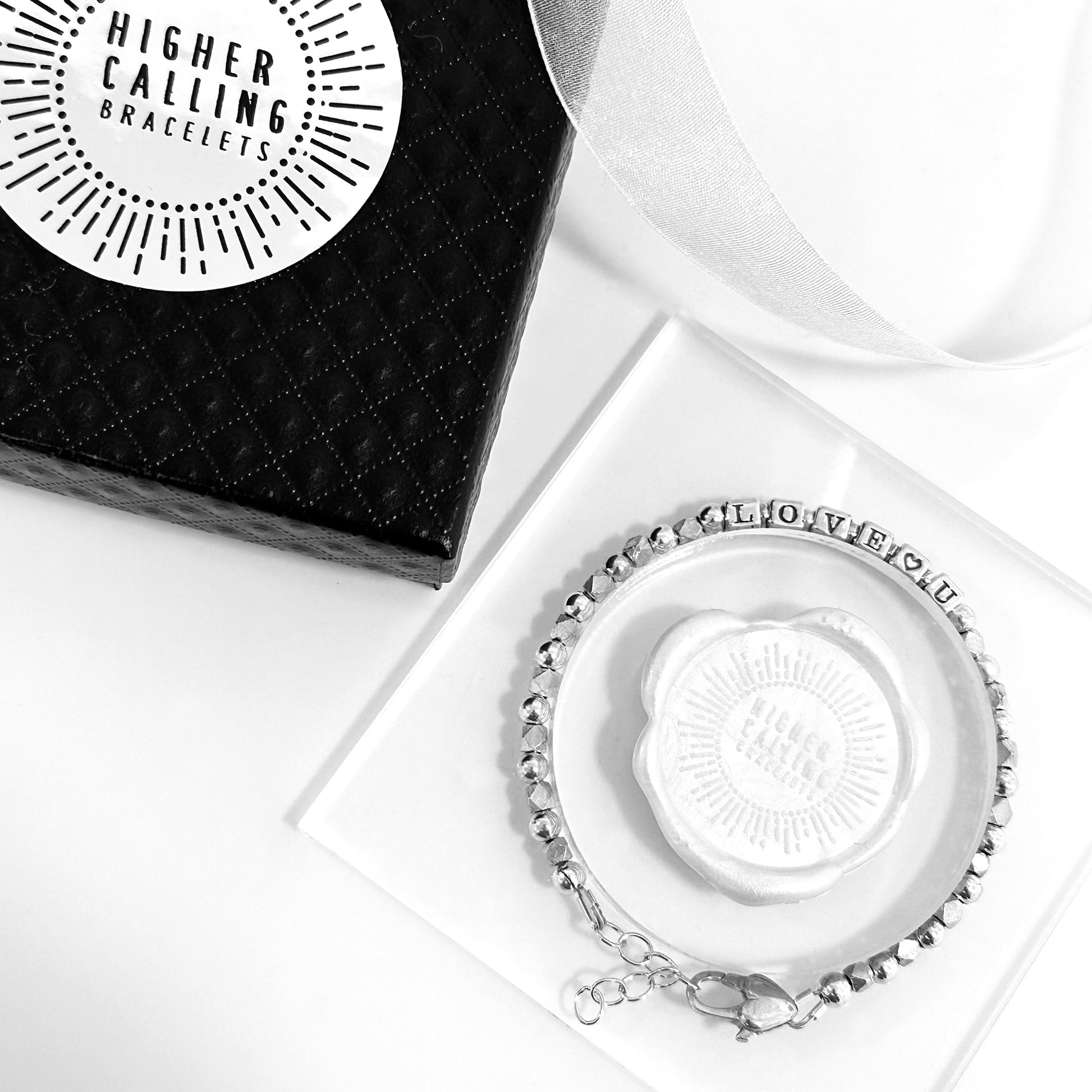 Packaging for custom sterling silver word bracelets by Higher Calling Bracelets