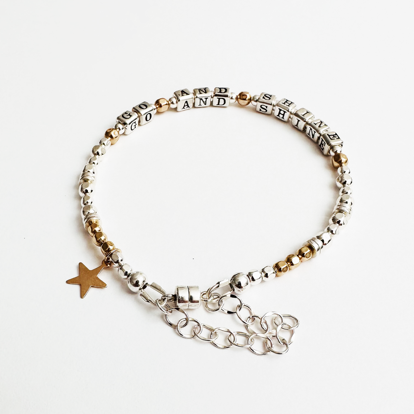 Go and Shine Good Luck, Graduation, New Job, Retirement Bracelet in sterling silver and gold, featuring a magnetic closure and gold star